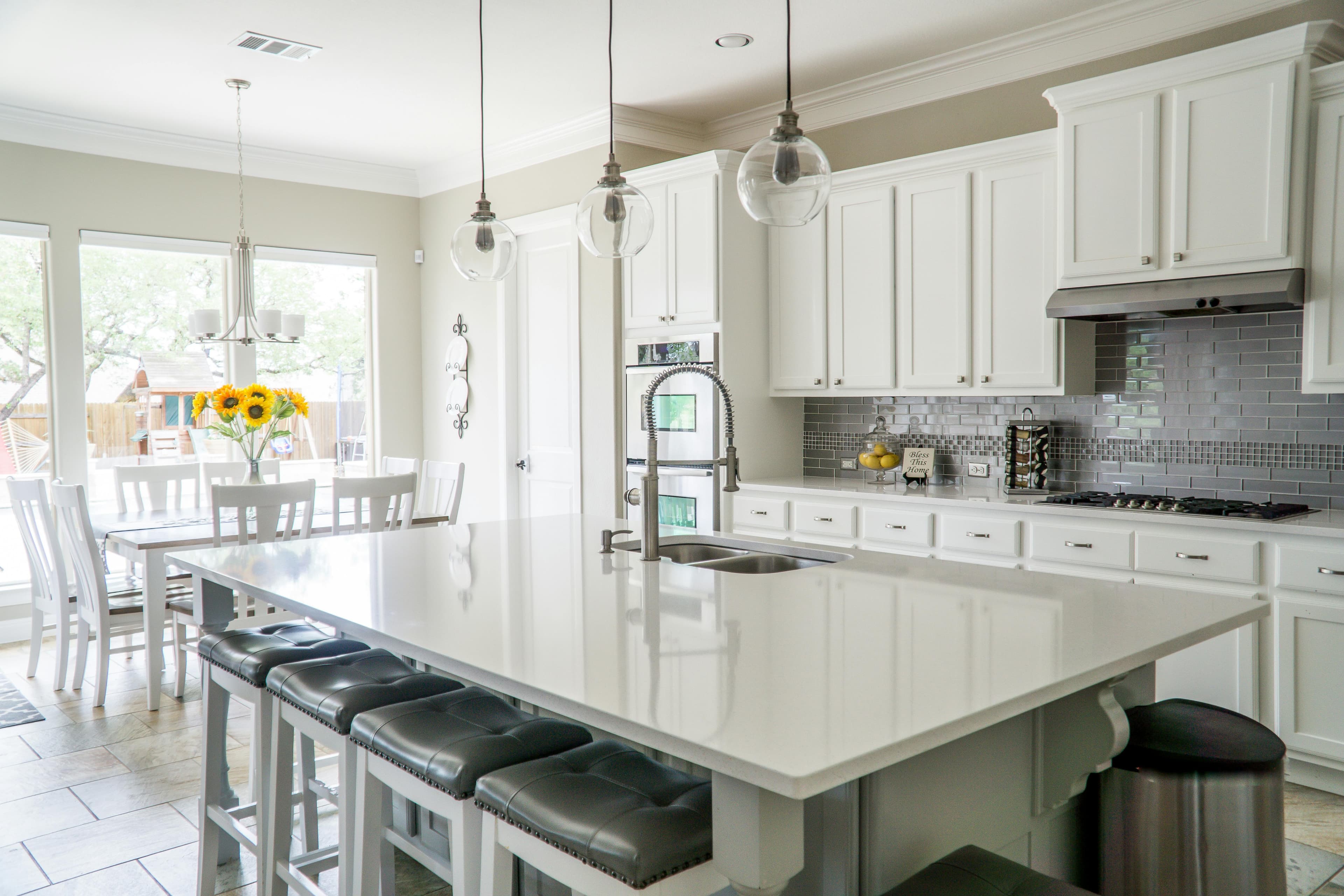 Minimalist dining area with kitchen island.